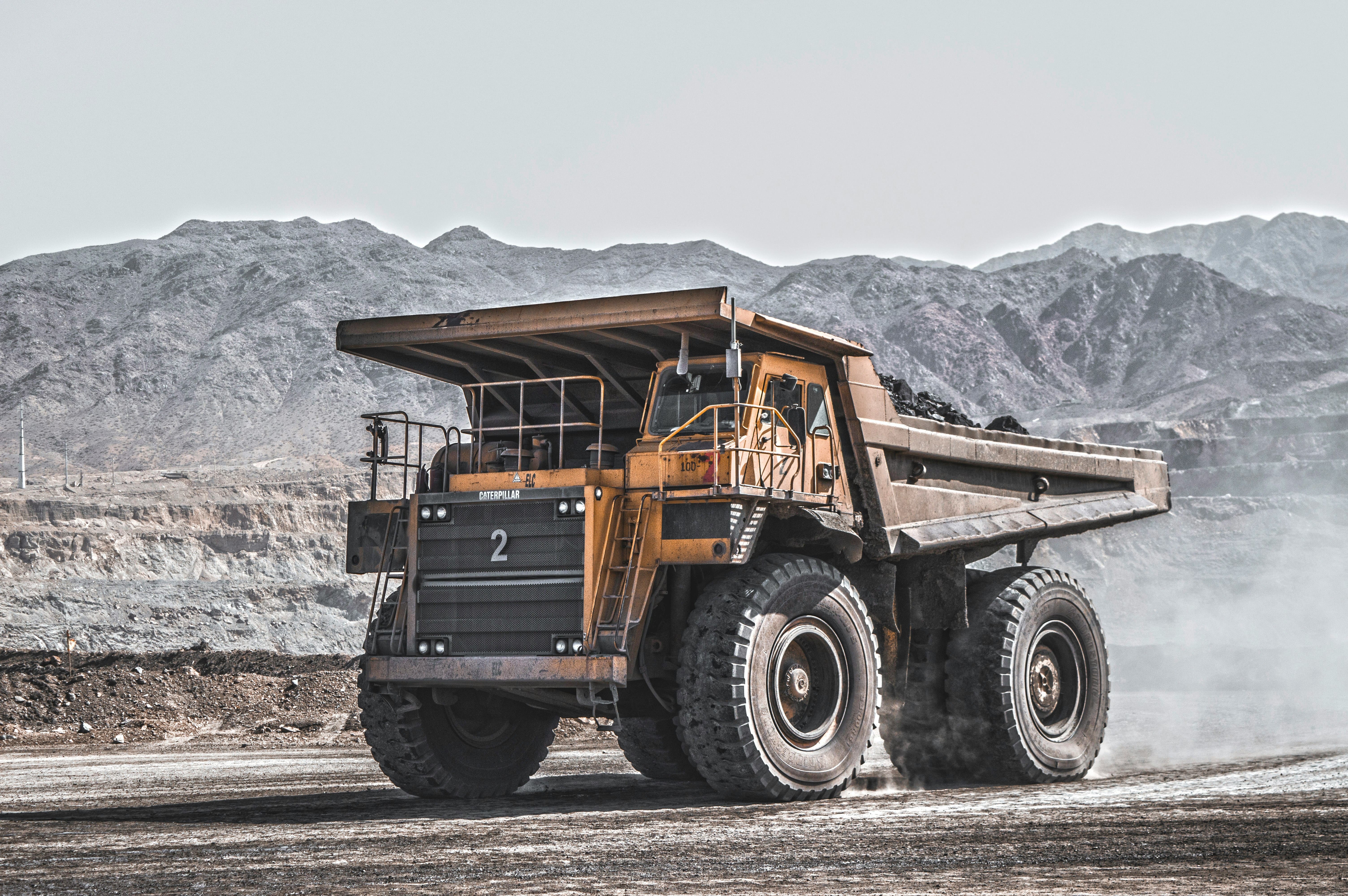 Mining trucks at Maharashtra quarry site with GPS tracking